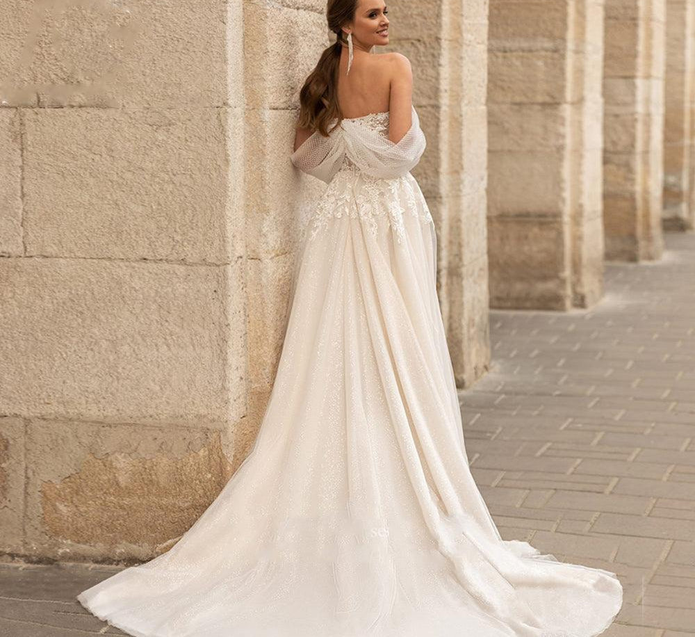 Elegant wedding dress with a modern design with open sleeves and shiny - HABASH FASHION