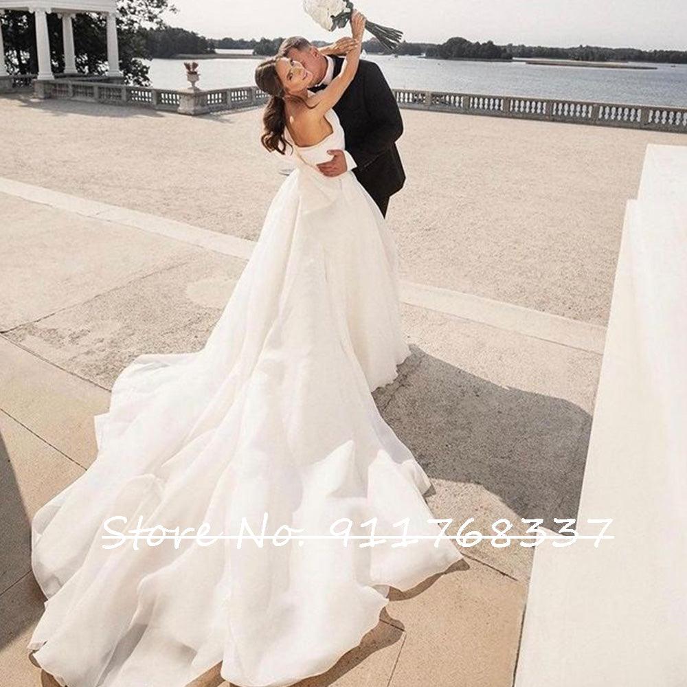 One-shoulder organza wedding dress with a simple slit with a bow-back - HABASH FASHION